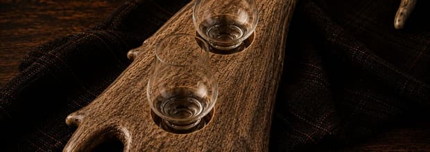 The piece with its Glencairn glasses and no decanter